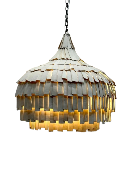 A modern pendant light with a tiered, shaggy shade made of overlapping rectangular clay parts