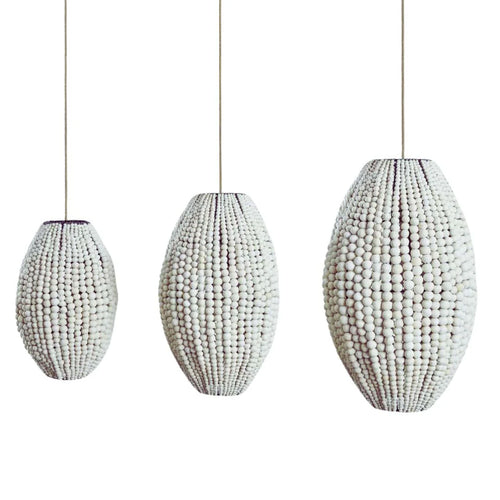Three beaded pendant lights of varying sizes 