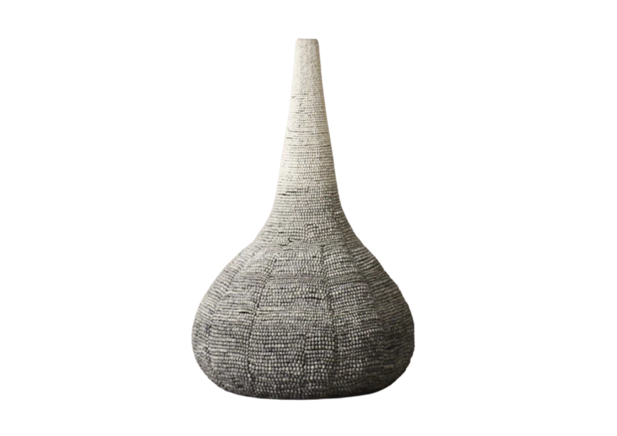 A tall, traditional African calabash shaped beaded pendant light