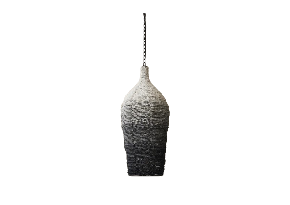 A hanging cocoon shaped pendant light with a clay beads