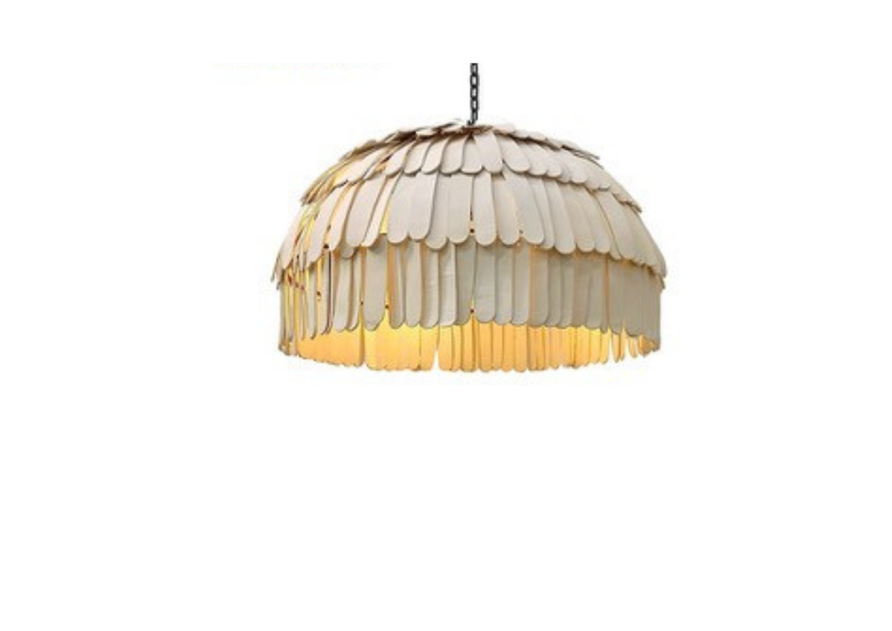 A dome-shaped pendant light fixture made of overlapping clay pieces.