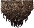 A clay beaded chandelier with multiple tiers of cascading bead strands and hanging fringe.