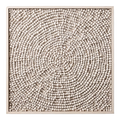 wall art piece with clay beads arranged in a spiral on a wood frame