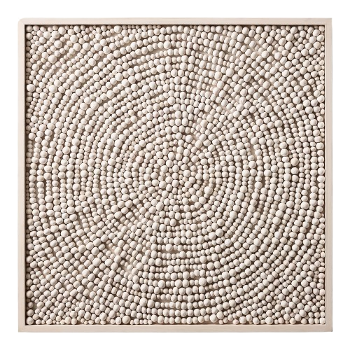 wall art piece with clay beads arranged in a spiral on a wood frame