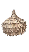 A dome-shaped pendant light fixture made of overlapping natural clay in bark shaped pieces.